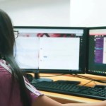 A person working with a desktop