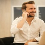 person using phone with VoIP