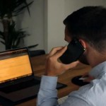 Speaking with customer on the phone.