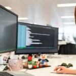 Copywriting virtual assistant doing work on a desktop.