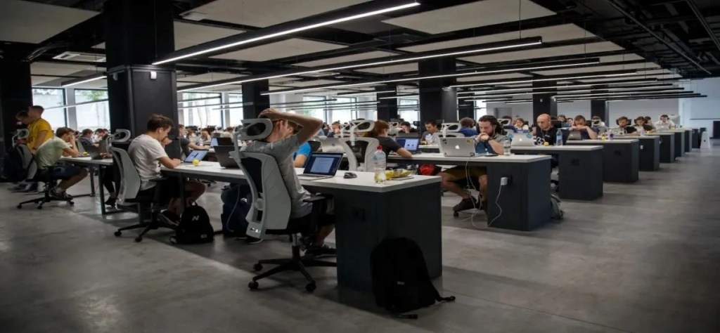 people working in a center