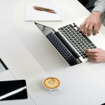 Person working on BPO on a laptop