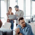 People talking about business process outsourcing in office