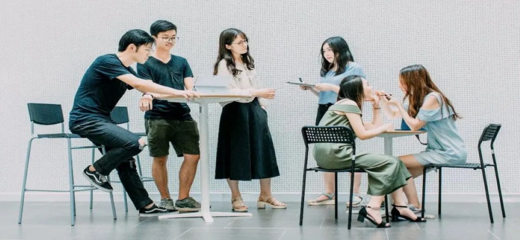 A group of six people connecting