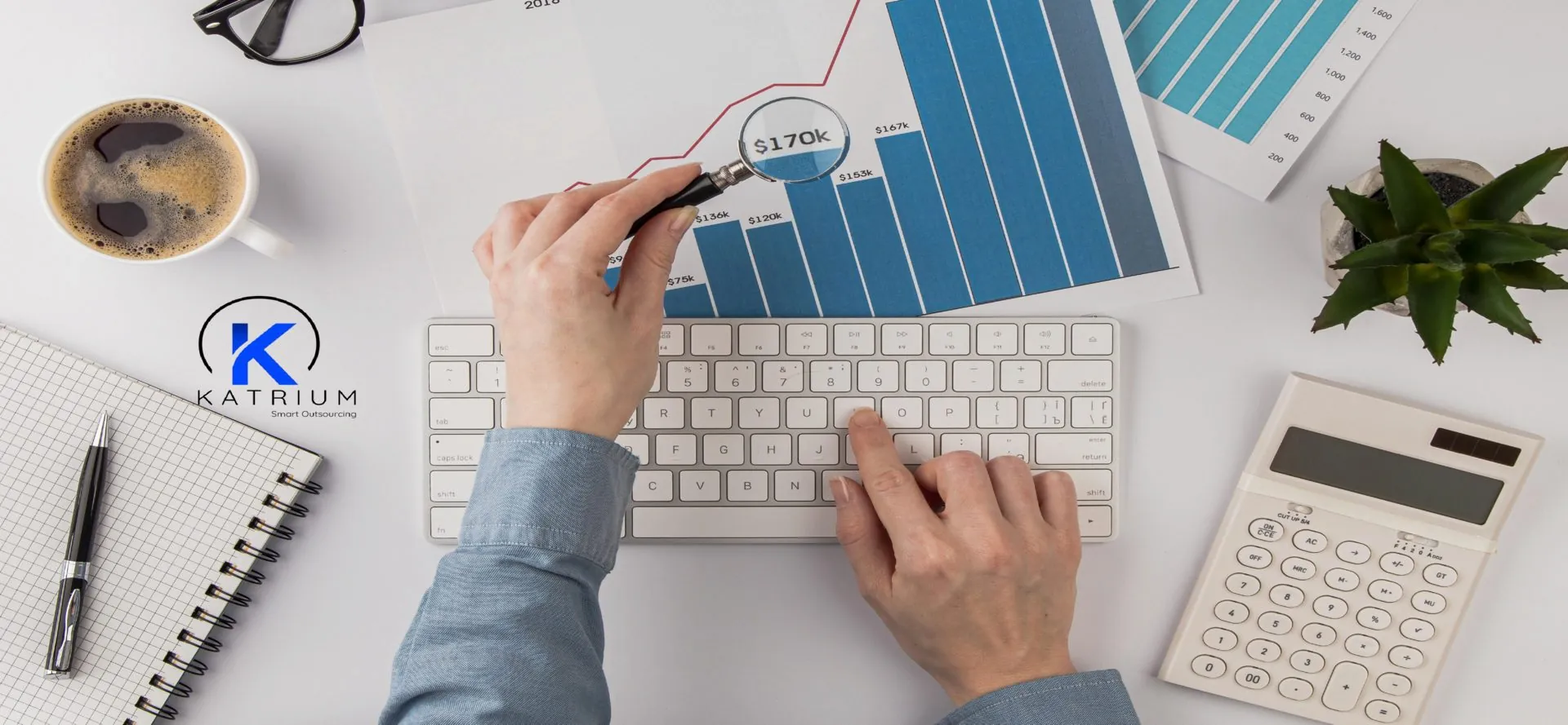 A person holding a magnifying glass to a investment graph