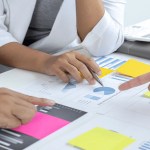 Group of people working on types of data