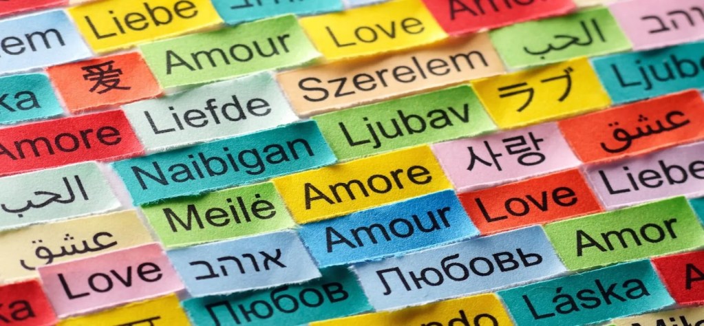 Image depicts various words in different languages, such as the word "Love".  