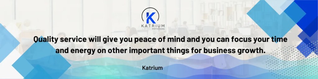 A banner image for KATRIUM Smart Outsourcing. The company logo is prominently displayed above a quote that is overlaid on a blurred image of an office with people working. The quote reads: 'Quality service will give you peace of mind and you can focus your time and energy on other important things for business growth.' The quote is attributed to 'Katrium' below it.