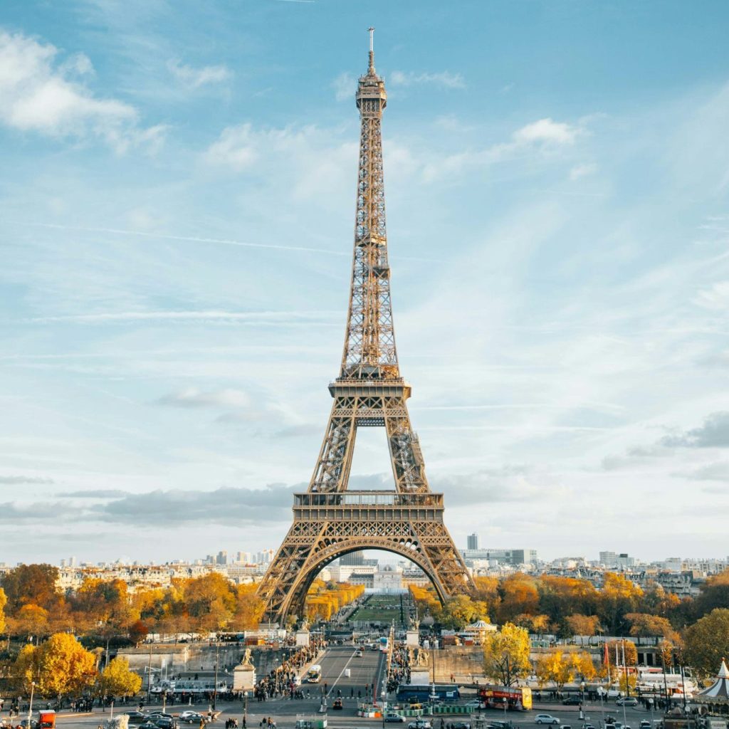 French-speaking sales support representation with Eiffel Tower in Paris