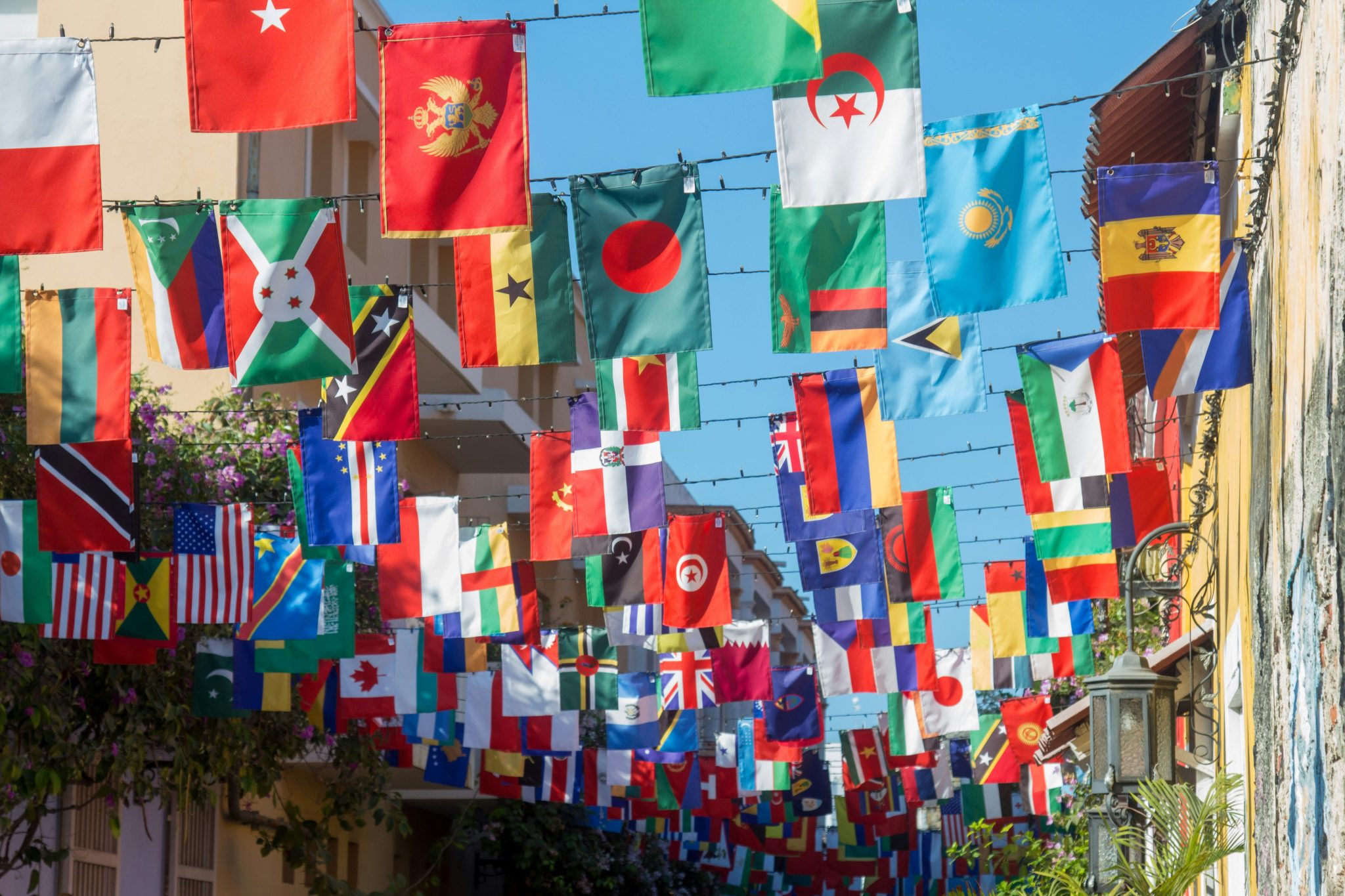 Multilingual communication and language diversity represented by international flags