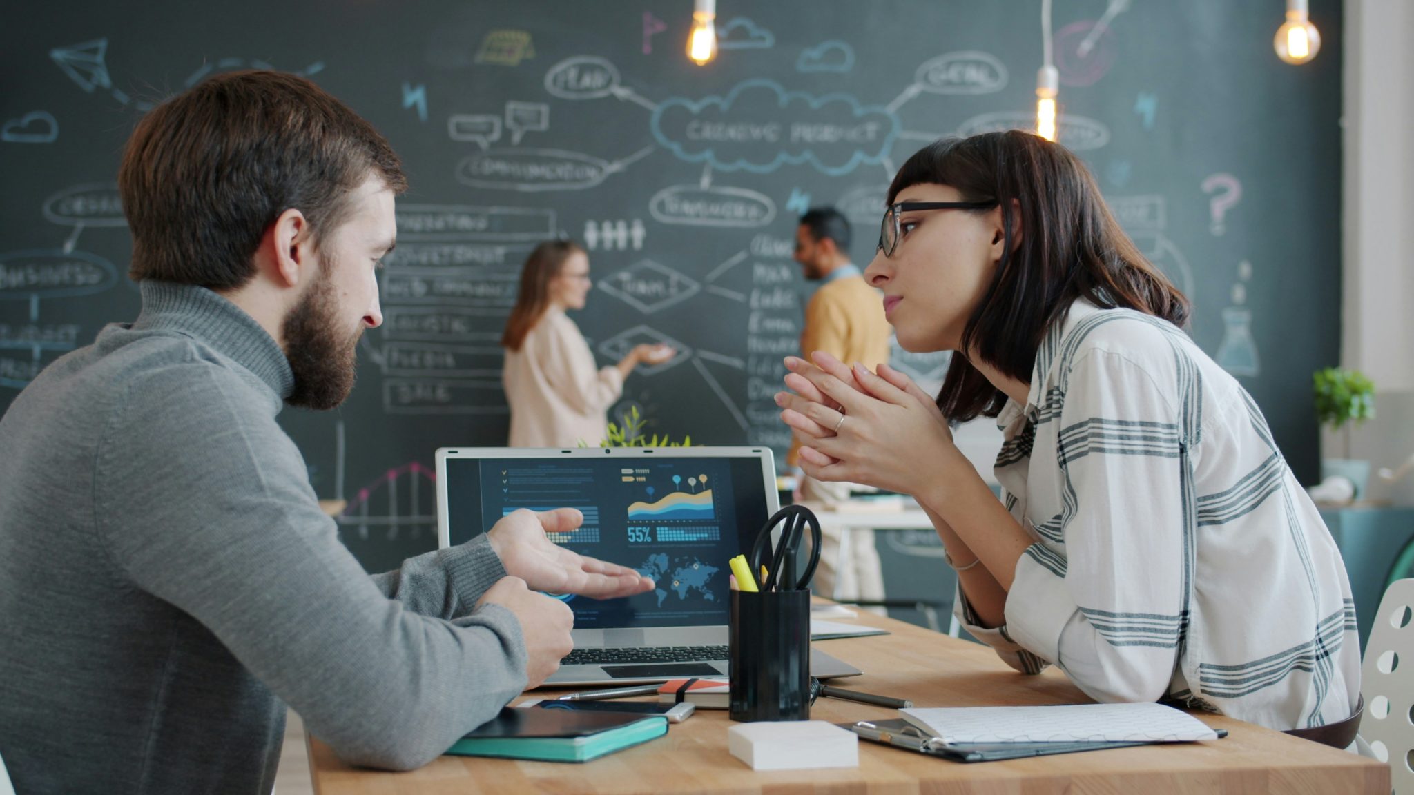 Consumer research team discussing customer insights and market research strategies in a collaborative meeting